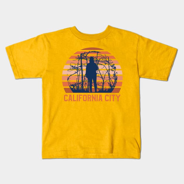 California City Sunset, Guy Standing in the Bushes with Trees, Gift for sunset lovers T-shirt, Camping, Camper Kids T-Shirt by AbsurdStore